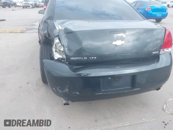 ✅ 2014 Chevrolet Impala LTZ • VIN: 2G1WC5E3XE1189956 • Lot: 43718567. Listed on IAAI with 142,559 mi. Free auction sales archive from the USA and detailed vehicle history report at DreamBid. Image 12.