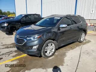 2018 Chevrolet Equinox Premier z VIN 2GNAXNEX5J6229633, wystawiony jako Copart lot #85733235 z przebiegiem 71 508 mil mil oraz Szkoda całkowita • Salvage title. Historia ofert i sprzedaży dostępna na DreamBid. Obrazek 1.