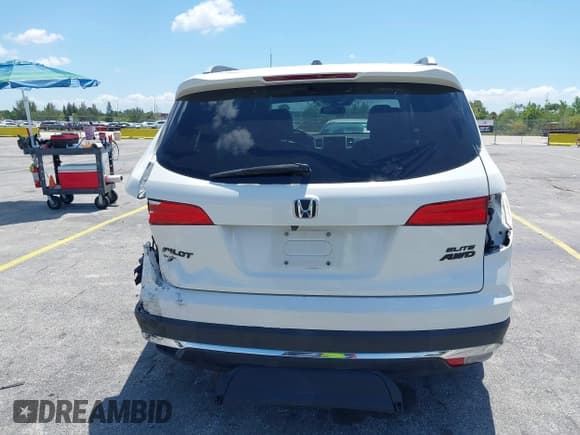 ✅ 2018 Honda Pilot Elite • VIN: 5FNYF6H00JB058623 • Lot: 42323415. Listed on IAAI with 102,015 mi. Free auction sales archive from the USA and detailed vehicle history report at DreamBid. Image 17.
