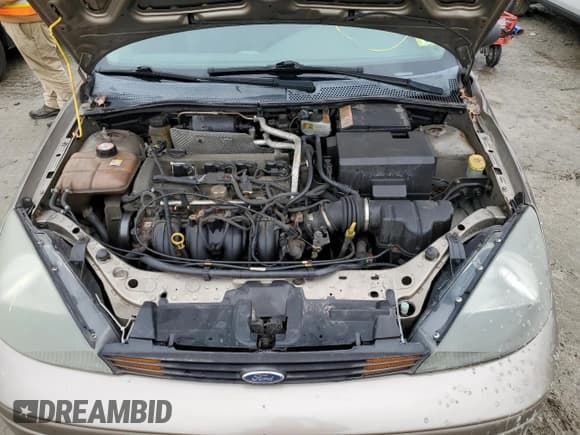 ✅ 2004 Ford Focus LX • VIN: 1FAFP33Z74W132828 • Lot: 45993904. Listed on Copart with 104,735 mi. Free auction sales archive from the USA and detailed vehicle history report at DreamBid. Image 11.