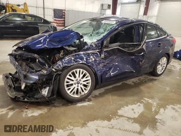 ✅ 2016 Ford Focus Titanium • VIN: 1FADP3J27GL310367 • Лот: 55048005. Опубликован ранее на Copart с пробегом 86 676 миль. Бесплатный доступ к архиву аукционных продаж из США и подробный отчёт об истории автомобиля на DreamBid. Изображение 1.