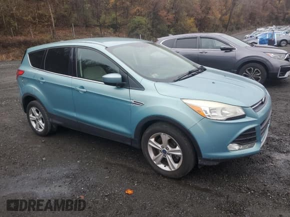 ✅ 2013 Ford Escape SE • VIN: 1FMCU9GX4DUD06461 • Lot: 91730445. Listed on Copart with 76,613 mi. Free auction sales archive from the USA and detailed vehicle history report at DreamBid. Image 4.