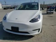 ✅ 2023 Tesla Model Y Long Range • VIN: 7SAYGDEE9PA118473 • Lot: 89553285. Listed on Copart with 25,093 mi. Free auction sales archive from the USA and detailed vehicle history report at DreamBid. Image 14.