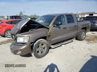 2010 Dodge Dakota Laramie с VIN 1D7RW5GP7AS203338, выставлен на аукционе Copart как лот 74550574 с пробегом 94 732 миль миль и Списание • Salvage title. История ставок и продаж доступна на DreamBid. Изображение 1.