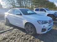 ✅ 2015 BMW X4 xDrive28i • VIN: 5UXXW3C52F0M87926 • Lot: 94218295. Listed on Copart with 94,567 mi. Free auction sales archive from the USA and detailed vehicle history report at DreamBid. Image 4.