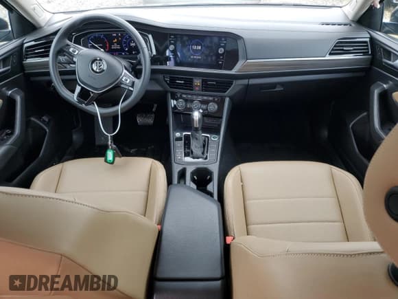 ✅ 2021 Volkswagen Jetta SEL • VIN: 3VWE57BU5MM013374 • Лот: 58579395. Опубликован ранее на Copart с пробегом 50 968 миль. Бесплатный доступ к архиву аукционных продаж из США и подробный отчёт об истории автомобиля на DreamBid. Изображение 8.