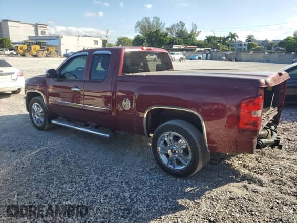 2013 Chevrolet Silverado 1500 LT with VIN 1GCRCSE05DZ261175, listed as a Copart auction lot 87035465 with 203,169 mi miles and Salvage title. Bid and sale history available at DreamBid. Image 2.
