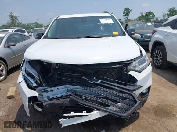 2021 Chevrolet Traverse Premier z VIN 1GNERKKW9MJ224531, wystawiony jako IAAI lot #42418665 z przebiegiem 49 188 mil mil oraz . Historia ofert i sprzedaży dostępna na DreamBid. Obrazek 12.