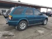 ✅ 1999 Isuzu Rodeo S • VIN: 4S2CM58W5X4313060 • Lot: 62211235. Wystawiony na Copart z przebiegiem 157 222 mil. Bezpłatny archiwum sprzedaży aukcyjnych z USA i szczegółowy raport historii pojazdu na DreamBid. Zdjęcie 3.