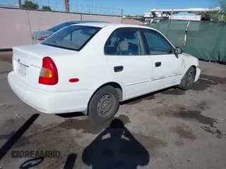 ✅ 2002 Hyundai Accent GL • VIN: KMHCG45CX2U346907 • Lot: 43476698. Wystawiony na IAAI z przebiegiem 105 557 mil. Bezpłatny archiwum sprzedaży aukcyjnych z USA i szczegółowy raport historii pojazdu na DreamBid. Zdjęcie 4.