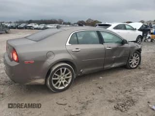 ✅ 2012 Chevrolet Malibu LTZ • VIN: 1G1ZG5E78CF285305 • Lot: 81693474. Listed on Copart with 164,134 mi. Free auction sales archive from the USA and detailed vehicle history report at DreamBid. Image 3.