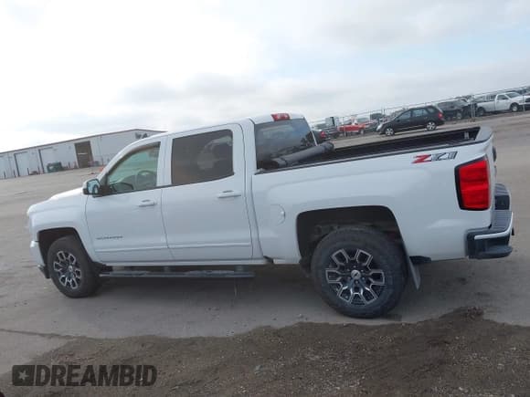 ✅ 2018 Chevrolet Silverado 1500 LT • VIN: 3GCUKREC8JG443934 • Lot: 43266162. Listed on IAAI with 79,404 mi. Free auction sales archive from the USA and detailed vehicle history report at DreamBid. Image 14.