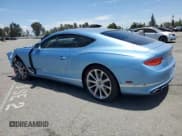 ✅ 2022 Bentley Continental GT GT V8 • VIN: SCBCG2ZG4NC094932 • Lot: 64056355. Listed on Copart with 6,596 mi. Free auction sales archive from the USA and detailed vehicle history report at DreamBid. Image 2.