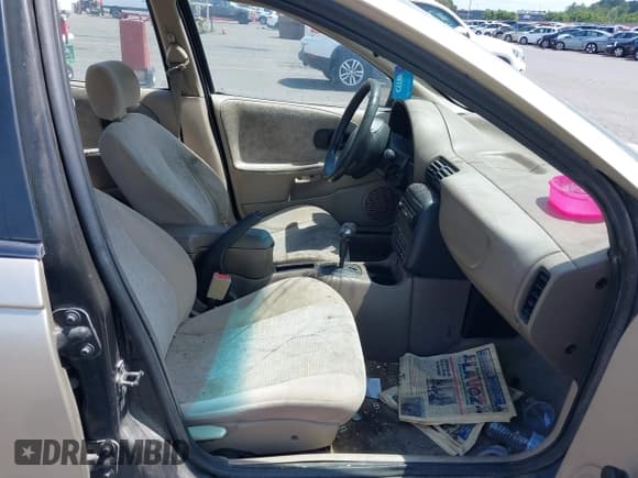 ✅ 1999 Saturn SL • VIN: 1G8ZK5275XZ283178 • Lot: 42303549. Wystawiony na IAAI z przebiegiem 216 776 mil. Bezpłatny archiwum sprzedaży aukcyjnych z USA i szczegółowy raport historii pojazdu na DreamBid. Zdjęcie 5.