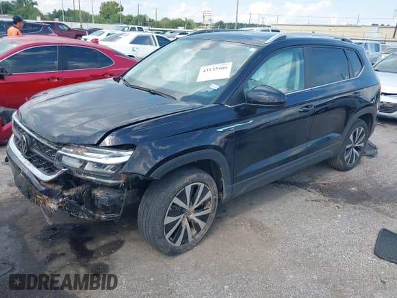 ✅ 2023 Volkswagen Taos SE • VIN: 3VVEX7B26PM358950 • Лот: 43135466. Опубликован ранее на IAAI с пробегом 26 014 миль. Бесплатный доступ к архиву аукционных продаж из США и подробный отчёт об истории автомобиля на DreamBid. Изображение 2.