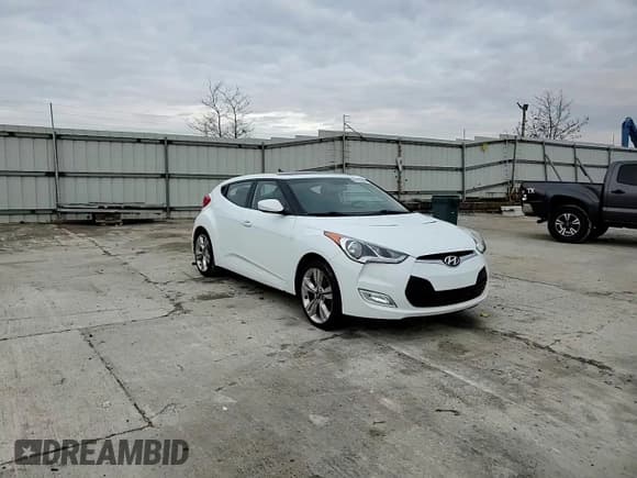 ✅ 2014 Hyundai Veloster • VIN: KMHTC6ADXEU184741 • Lot: 81136964. Wystawiony na Copart z przebiegiem 85 453 mil. Bezpłatny archiwum sprzedaży aukcyjnych z USA i szczegółowy raport historii pojazdu na DreamBid. Zdjęcie 10.