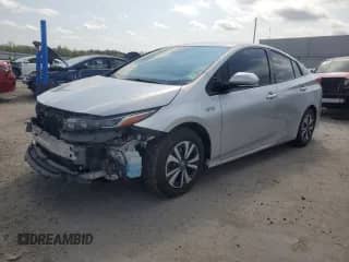 2017 Toyota Prius Plus с VIN JTDKARFP6H3001565, выставлен на аукционе Copart как лот 82028865 с пробегом 159 883 миль миль и Списание • Salvage title. История ставок и продаж доступна на DreamBid. Изображение 1.