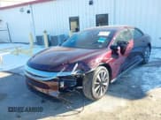 ✅ 2023 Lucid Air Pure • VIN: 50EA1PFA5PA006306 • Lot: 41235791. Wystawiony na IAAI z przebiegiem 5 240 mil. Bezpłatny archiwum sprzedaży aukcyjnych z USA i szczegółowy raport historii pojazdu na DreamBid. Zdjęcie 6.