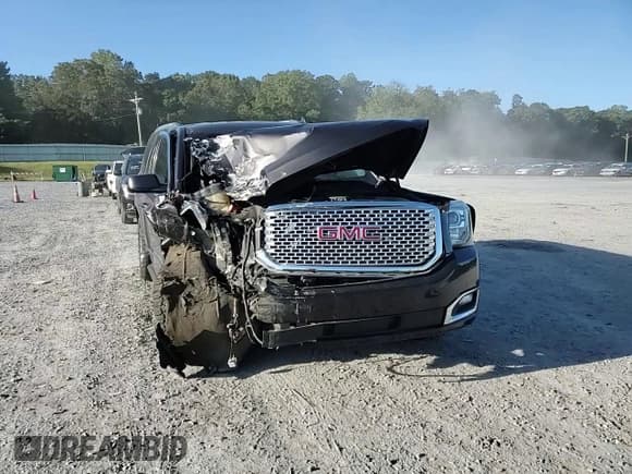 ✅ 2016 GMC Yukon Denali • VIN: 1GKS2CKJ4GR350574 • Lot: 84559845. Listed on Copart with Not provided. Free auction sales archive from the USA and detailed vehicle history report at DreamBid. Image 14.