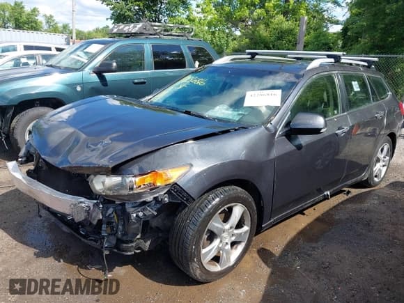 ✅ 2012 Acura TSX Technology • VIN: JH4CW2H67CC001499 • Lot: 42286816. Listed on IAAI with 144,209 mi. Free auction sales archive from the USA and detailed vehicle history report at DreamBid. Image 18.