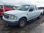 ✅ 2000 Ford F-150 XL • VIN: 1FTRX17LXYNA38021 • Лот: 43087000. Опубликован ранее на IAAI с пробегом Не указан. Бесплатный доступ к архиву аукционных продаж из США и подробный отчёт об истории автомобиля на DreamBid. Изображение 2.