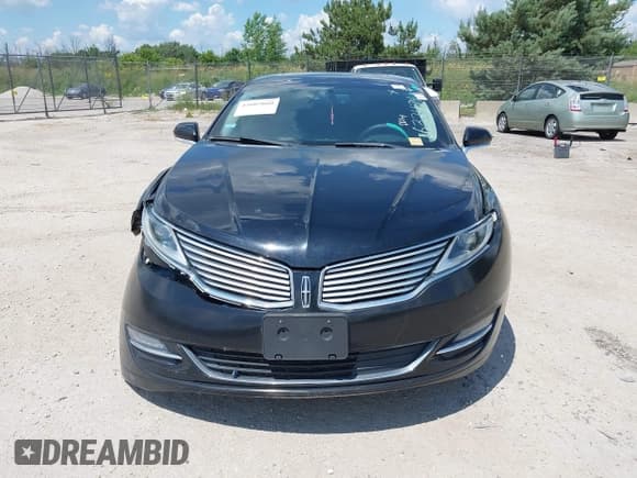 ✅ 2016 Lincoln MKZ • VIN: 3LN6L2J93GR632474 • Lot: 42607060. Listed on IAAI with 99,490 mi. Free auction sales archive from the USA and detailed vehicle history report at DreamBid. Image 12.