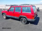 ✅ 1996 Jeep Cherokee Sport • VIN: 1J4FT68S0TL225719 • Lot: 42121351. Listed on IAAI with 237,602 mi. Free auction sales archive from the USA and detailed vehicle history report at DreamBid. Image 3.