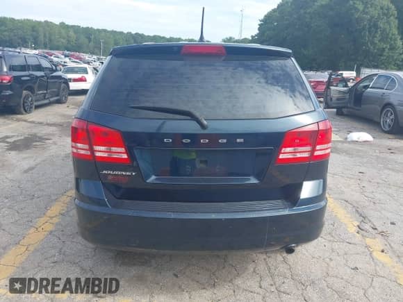 2015 Dodge Journey American Value z VIN 3C4PDCABXFT610861, wystawiony jako IAAI lot #43068421 z przebiegiem 153 937 mil mil oraz . Historia ofert i sprzedaży dostępna na DreamBid. Obrazek 16.