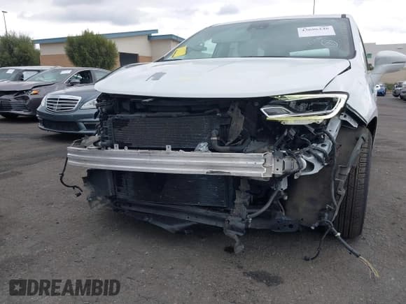 ✅ 2022 Chrysler Pacifica Hybrid Touring L • VIN: 2C4RC1L78NR122793 • Lot: 43696246. Listed on IAAI with 70,045 mi. Free auction sales archive from the USA and detailed vehicle history report at DreamBid. Image 6.