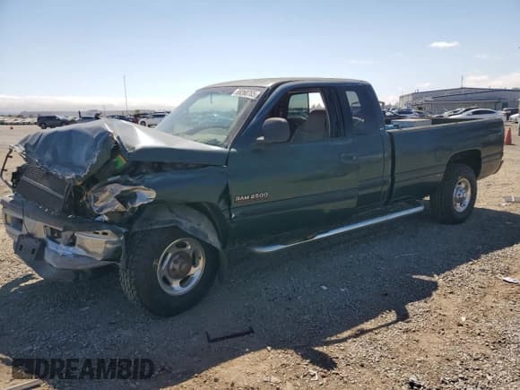 ✅ 2000 Dodge 2500 • VIN: 1B7KC2366YJ165410 • Lot: 69260765. Listed on Copart with 145,393 mi. Free auction sales archive from the USA and detailed vehicle history report at DreamBid. Image 1.