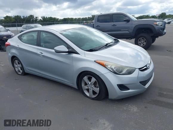 ✅ 2013 Hyundai Elantra GLS • VIN: 5NPDH4AE6DH373385 • Lot: 43404309. Listed on IAAI with 125,089 mi. Free auction sales archive from the USA and detailed vehicle history report at DreamBid. Image 1.
