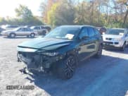 ✅ 2025 Mazda CX-50 S Premium Plus • VIN: 7MMVABEM7SN373519 • Лот: 43615327. Опубликован ранее на IAAI с пробегом 13 139 миль. Бесплатный доступ к архиву аукционных продаж из США и подробный отчёт об истории автомобиля на DreamBid. Изображение 21.