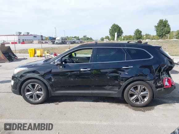✅ 2014 Hyundai Santa Fe GLS • VIN: KM8SN4HF9EU078833 • Лот: 43163419. Опубликован ранее на IAAI с пробегом 148 066 миль. Бесплатный доступ к архиву аукционных продаж из США и подробный отчёт об истории автомобиля на DreamBid. Изображение 14.