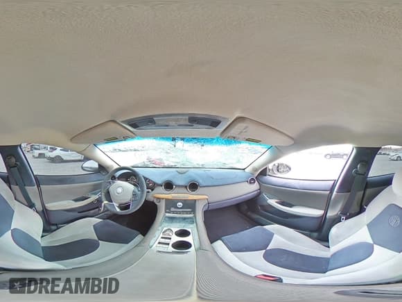 ✅ 2012 Fisker Karma EcoChic • VIN: YH4K16AA0CA000133 • Lot: 82445934. Listed on Copart with 104,427 mi. Free auction sales archive from the USA and detailed vehicle history report at DreamBid. Image 12.