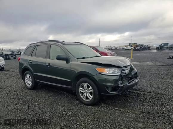 ✅ 2012 Hyundai Santa Fe GLS • VIN: 5XYZGDAB0CG105078 • Лот: 90475405. Размещён на Copart с пробегом 101 439 миль миль. Получите бесплатный доступ к архиву аукционных продаж из США и посмотрите подробный отчёт об истории автомобиля на DreamBid. Изображение 14.