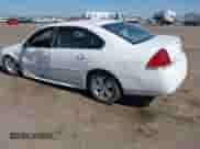 2013 Chevrolet Impala LS with VIN 2G1WF5E37D1141434, listed as a IAAI auction lot 43322378 with 159,237 mi miles and . Bid and sale history available at DreamBid. Image 3.