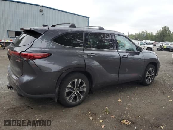 ✅ 2022 Toyota Highlander Hybrid XLE • VIN: 5TDHBRCH6NS540878 • Lot: 80414265. Listed on Copart with 76,899 mi. Free auction sales archive from the USA and detailed vehicle history report at DreamBid. Image 3.