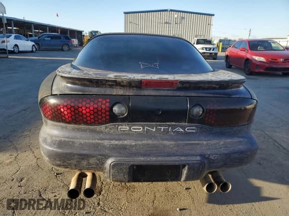 ✅ 1999 Pontiac Firebird Firebird • VIN: 2G2FS22KXX2216224 • Lot: 47316085. Listed on Copart with Not provided. Free auction sales archive from the USA and detailed vehicle history report at DreamBid. Image 6.