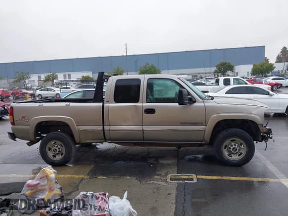 ✅ 2001 GMC Sierra 2500HD SL • VIN: 1GTHK29U91Z283753 • Лот: 43751612. Опубликован ранее на IAAI с пробегом 114 965 миль. Бесплатный доступ к архиву аукционных продаж из США и подробный отчёт об истории автомобиля на DreamBid. Изображение 14.
