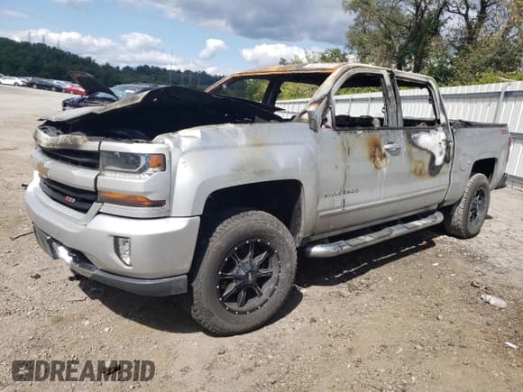 ✅ 2018 Chevrolet Silverado 1500 LT • VIN: 3GCUKREC7JG236127 • Лот: 68377474. Опубликован ранее на Copart с пробегом Не указан. Бесплатный доступ к архиву аукционных продаж из США и подробный отчёт об истории автомобиля на DreamBid. Изображение 1.