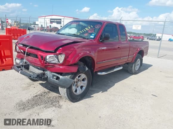 ✅ 2002 Toyota Tacoma PreRunner • VIN: 5TESN92N82Z057492 • Lot: 42711871. Listed on IAAI with 199,679 mi. Free auction sales archive from the USA and detailed vehicle history report at DreamBid. Image 2.