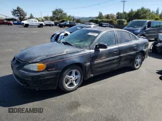 ✅ 2000 Pontiac Grand Am GT • VIN: 1G2NW52E3YC553038 • Лот: 67668845. Опубликован ранее на Copart с пробегом 215 693 миль. Бесплатный доступ к архиву аукционных продаж из США и подробный отчёт об истории автомобиля на DreamBid. Изображение 1.