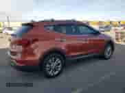 2017 Hyundai Santa Fe 2.0T z VIN 5XYZUDLA7HG490689, wystawiony jako Copart lot #53673385 z przebiegiem 131 435 mil mil oraz Szkoda całkowita • Salvage title. Historia ofert i sprzedaży dostępna na DreamBid. Obrazek 3.
