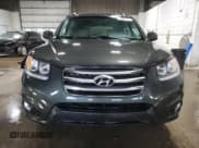 ✅ 2012 Hyundai Santa Fe SE • VIN: 5XYZH4AG3CG117525 • Lot: 75181374. Listed on Copart with 96,764 mi. Free auction sales archive from the USA and detailed vehicle history report at DreamBid. Image 5.
