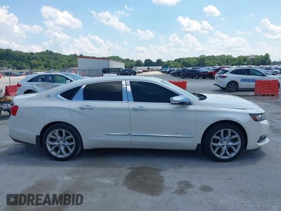 ✅ 2014 Chevrolet Impala LTZ • VIN: 1G1145SL0EU139017 • Лот: 42724589. Опубликован ранее на IAAI с пробегом 225 701 миль. Бесплатный доступ к архиву аукционных продаж из США и подробный отчёт об истории автомобиля на DreamBid. Изображение 13.