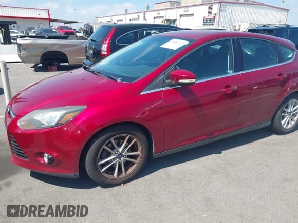 ✅ 2014 Ford Focus Titanium • VIN: 1FADP3N24EL158443 • Lot: 42801477. Listed on IAAI with 116,859 mi. Free auction sales archive from the USA and detailed vehicle history report at DreamBid. Image 2.