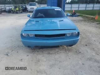 ✅ 2012 Dodge Challenger SXT Plus • VIN: 2C3CDYAG7CH100693 • Lot: 84772665. Wystawiony na Copart z przebiegiem 129 067 mil. Bezpłatny archiwum sprzedaży aukcyjnych z USA i szczegółowy raport historii pojazdu na DreamBid. Zdjęcie 5.