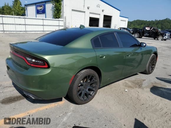 ✅ 2023 Dodge Charger SXT • VIN: 2C3CDXBG3PH674500 • Lot: 69868595. Listed on Copart with 24,205 mi. Free auction sales archive from the USA and detailed vehicle history report at DreamBid. Image 3.