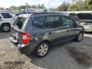 ✅ 2007 Kia Rondo LX • VIN: KNAFG525777082626 • Лот: 80005874. Опубликован ранее на Copart с пробегом 111 734 миль. Бесплатный доступ к архиву аукционных продаж из США и подробный отчёт об истории автомобиля на DreamBid. Изображение 3.