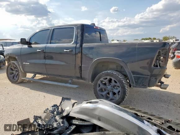 2021 Ram 1500 Limited with VIN 1C6SRFHT5MN665217, listed as a Copart auction lot 68471575 with 105,990 mi miles and Salvage title. Bid and sale history available at DreamBid. Image 2.